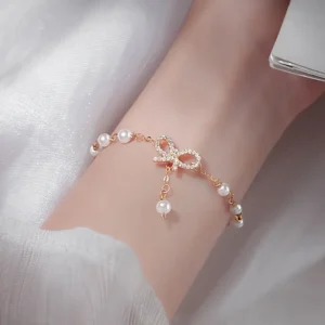 Elegant Bow & Imitation Pearl Bracelet
